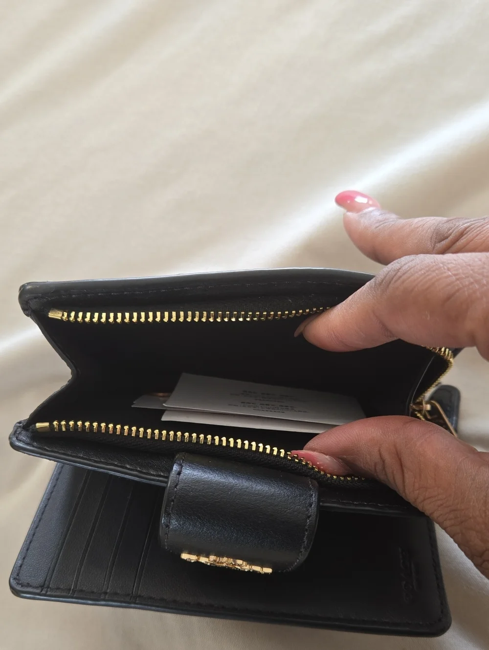 Coach Black Signature Compact Wallet with Gold Logo